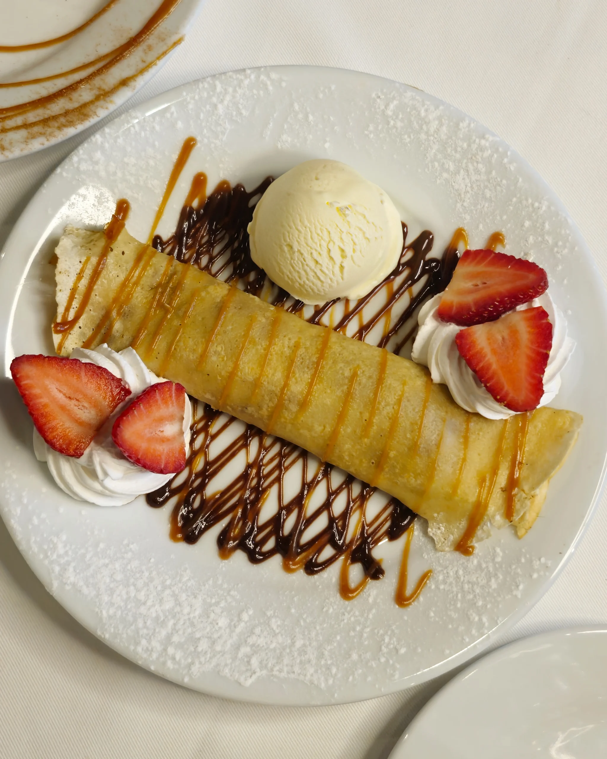 Panqueque carretillero dulce, especialidad con relleno casero, disponible en La Bistecca.